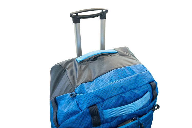 Poignée et poche sur le haut du sac Poignée et poche sur le haut du sac