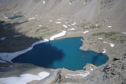 Lac des Neuf Couleurs (2841 m) vu de la Tête de la Frema