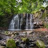 Au pied de la cascade de Lacessat en Aveyron